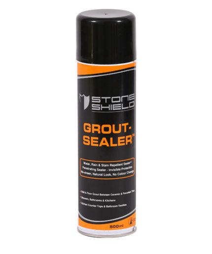 A-500ml-aerosol-can-of-Stoneshield-Grout-Sealer-featuring-a-black-and-orange-design-The-label-highlights-its-properties-as-a-water-rain-and-stain-repellent-sealer-with-invisible-protection-and-no-colour-change-The-product-is-suitable-for-wall-and-floor-grout-between-ceramic-and-porcelain-tiles-as-well-as-for-use-in-showers-bathrooms-kitchens-and-on-kitchen-countertops-and-bathroom-vanities