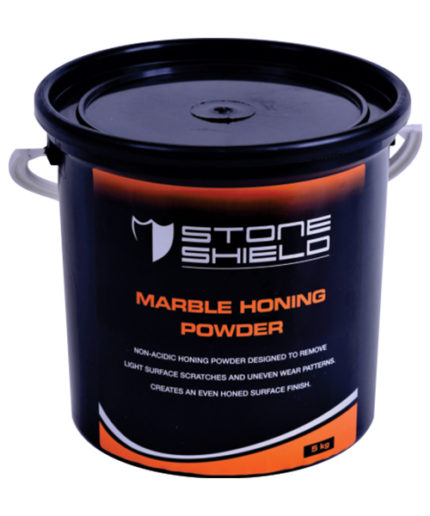 Image-of-a-black-container-of-Stoneshield-Marble-Honing-Powder-with-orange-and-white-labeling-The-label-states-that-the-product-is-a-non-acidic-honing-powder-designed-to-remove-light-surface-scratches-and-uneven-wear-patterns-creating-an-even-honed-surface-finish-The-container-size-is-5-kg