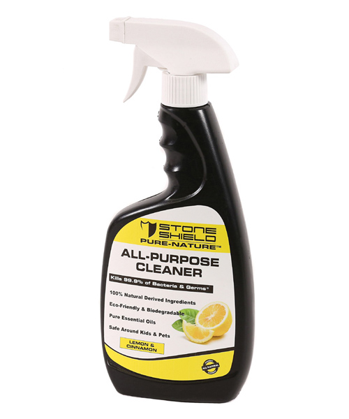 Image-of-Stoneshield-Pure-Nature-All-Purpose-Cleaner-in-a-black-spray-bottle-with-a-white-trigger-nozzle-The-label-has-a-yellow-and-white-design-displaying-the-Stoneshield-logo-at-the-top-The-product-is-advertised-as-killing-99.9-percent-of-bacteria-and-germs-and-is-made-from-100-percent-natural-derived-ingredients-Additional-key-features-include-being-eco-friendly-biodegradable-and-containing-pure-essential-oils-The-cleaner-is-also-labeled-as-safe-around-kids-and-pets-The-scent-is-specified-as-Lemon-and-Cinnamon-with-an-image-of-a-lemon-slice-on-the-label