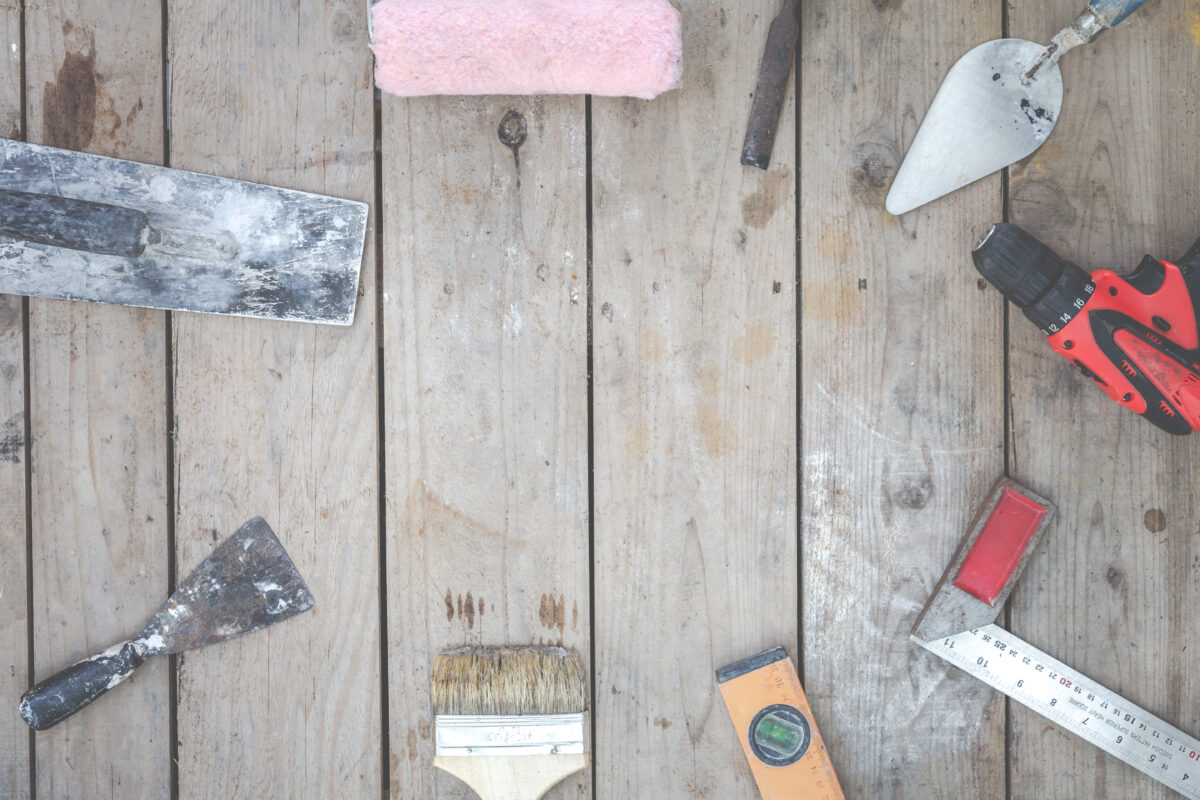A gauging trowel among other various construction tools